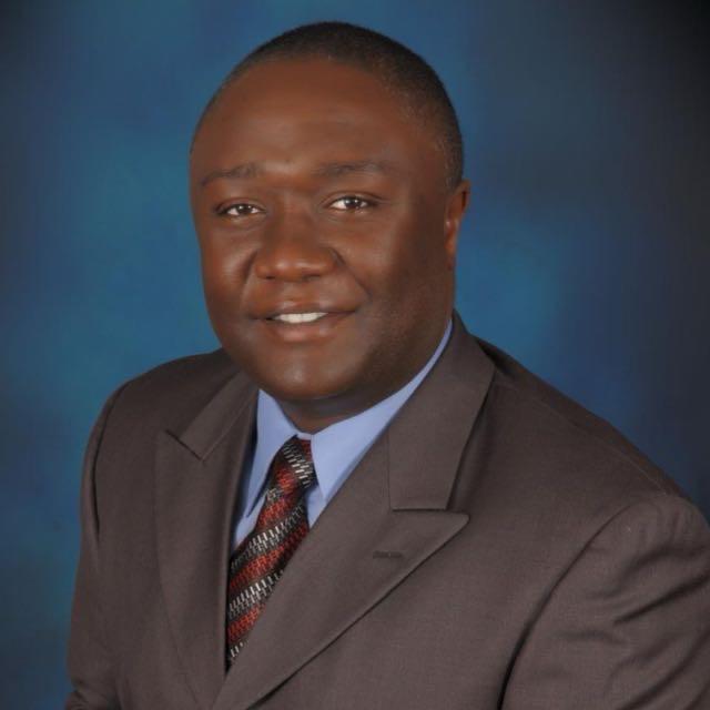 Portrait of Eric Njoroge, Human Resource Manager